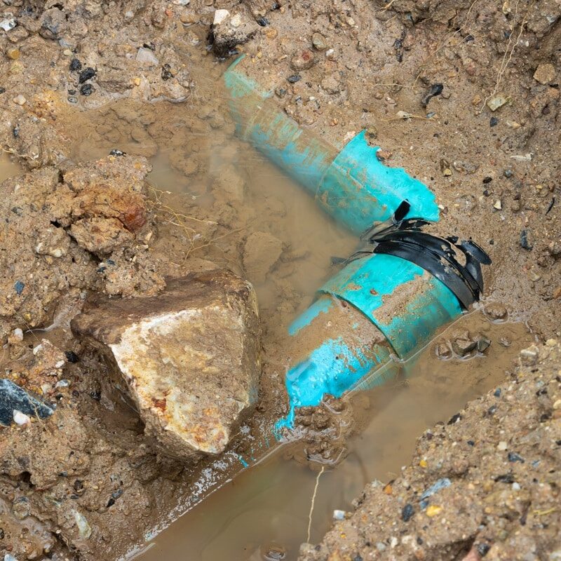 plumbing broken plastic pipe in the hole and water in wait repair